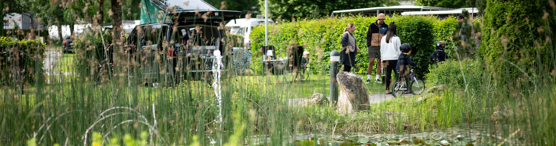 Stellplätze am Sportcamp Woferlgut mit Teich und Familie